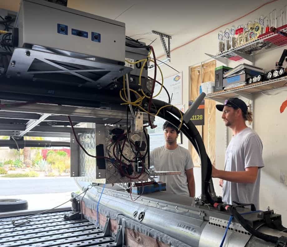 Team Inspiration member showcasing the WAM-V